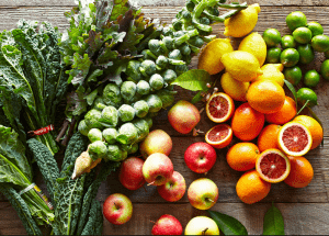 a group of fruits and vegetables on a wood surface Healthy Weight Loss Diets Runnymede